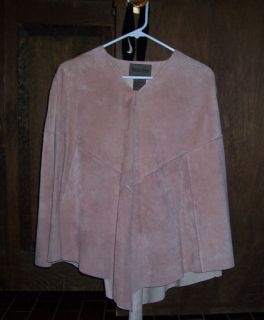 You are bidding on a new pink suede poncho by Brandon Thomas. It is