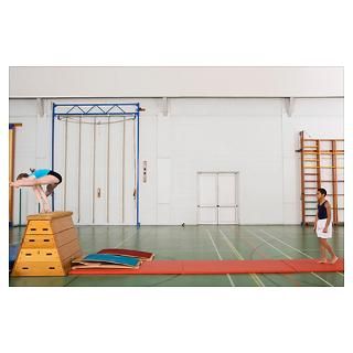 Wall Art  Posters  Gymnast vaulting in gymnasium