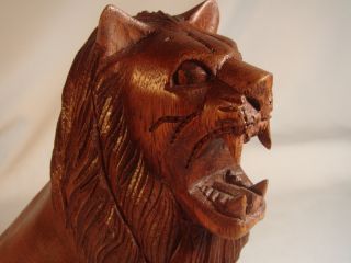 Bali Hand Carved Seated Roaring Lion Wood Sculpture