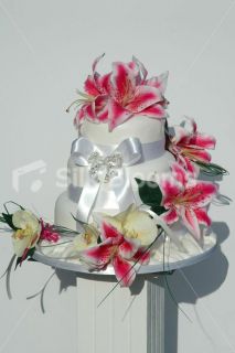 Fuchsia Stargazer Lily and Ivory Orchid Wrapping Wedding Cake Topper