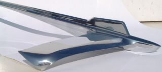This is a choice used 1956 Plymouth hood ornament. Part number is