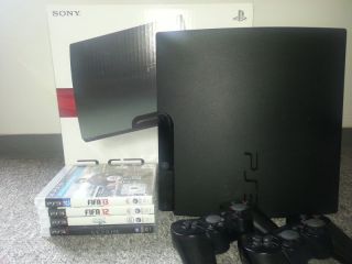 Playstation 3 incl. 4 Spielen Fifa 12/13, Skyrim, SSX 0013964338263