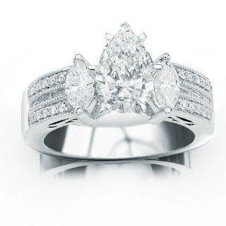 Baguette Channel Set Diamond Ring with a 0.79 Carat Oval